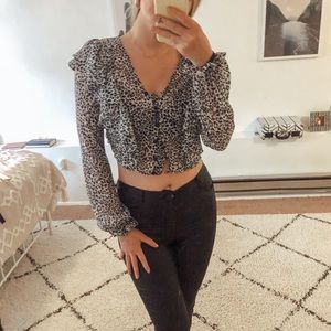 Ruffle, sleek, button up print blouse